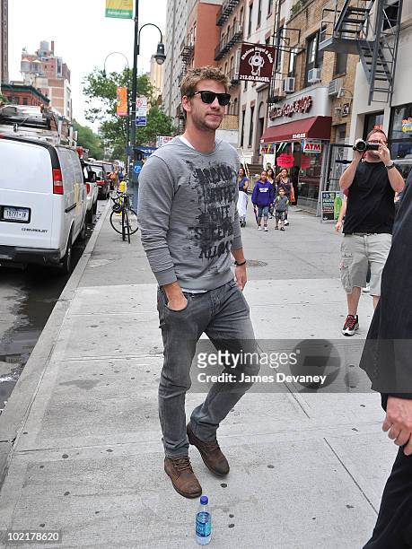 Liam Hemsworth visits Miley Cyrus at Gemini 14 salon on June 16, 2010 in New York City.