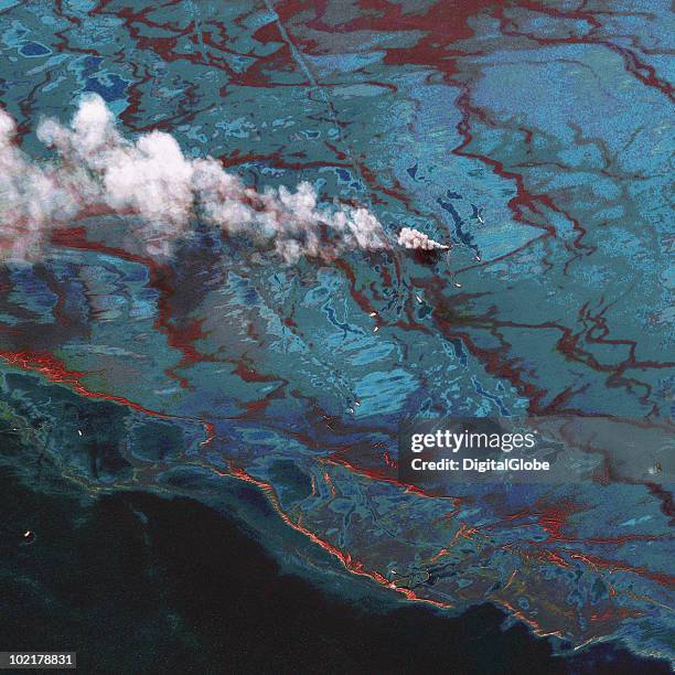 In this satellite image, vessels are seen at the site of the oil spill June 15 in the Gulf of Mexio. DC. BP agreed June 16, 2010 to place $20 billion...