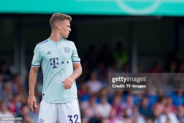 Joshua Kimmich of Bayern Muenchen looks on during the DFB Cup first round match between SV Drochtersen-Assel and Bayern Muenchen at Kehdinger Stadion...