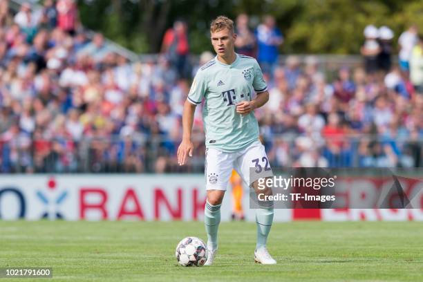 Joshua Kimmich of Bayern Muenchen controls the ball during the DFB Cup first round match between SV Drochtersen-Assel and Bayern Muenchen at...