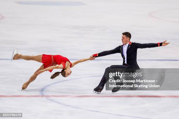 Anastasia Mishina and Aleksandr Galliamov of Russia compete in the Junior Pairs short program during the ISU Junior Grand Prix of Figure Skating at...