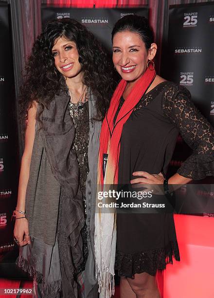 Pamela Love and a member of the press attend Sebastian Celebrates The 25th Anniversary Of Shaper Hairspray at Paramount Studios on June 15, 2010 in...