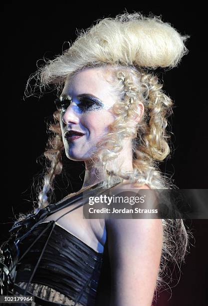 Model appears during the runway show at Sebastian Celebrates The 25th Anniversary Of Shaper Hairspray at Paramount Studios on June 15, 2010 in Los...