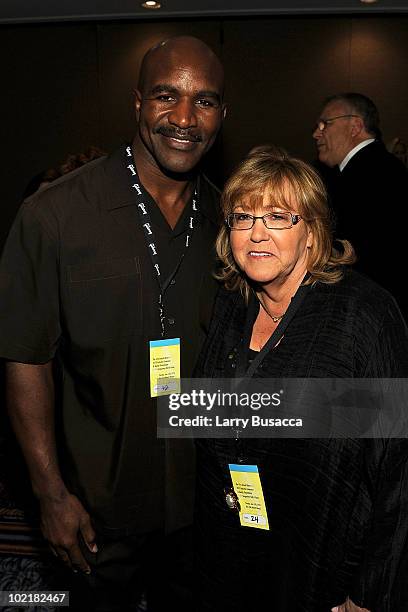 Evander Holyfield and President of The Songwriters Hall of Fame Linda Moran attend the 41st Annual Songwriters Hall of Fame Ceremony at The New York...