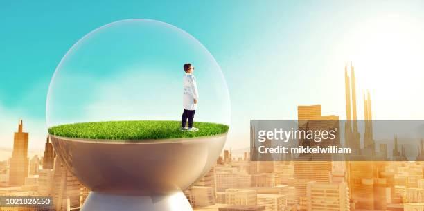 future city concept with people living in enviromental friendly houses - desert_climate stock pictures, royalty-free photos & images