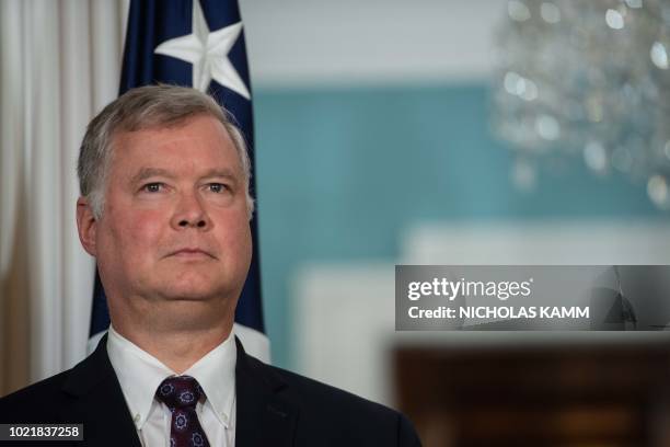 Steve Biegun looks as US Secretary of State Mike Pompeo announces him as special representative to North Korea at the State Department in Washington,...