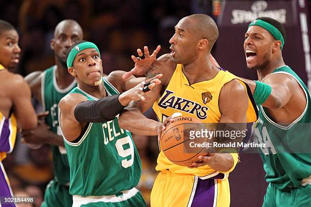 Kobe Bryant of the Los Angeles Lakers is double-teammed by Rajon Rondo and Paul Pierce of the Boston Celtics in the third quarter of Game Seven of...