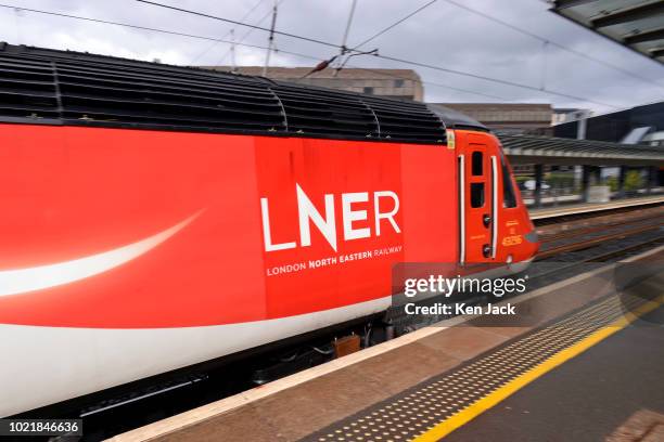 An east coast mainline express in the livery of London North Eastern Railway, the new operator of the service, following the early termination of the...