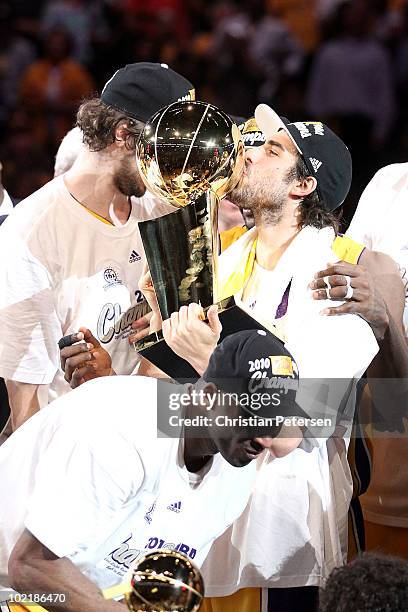 Sasha Vujacic of the Los Angeles Lakers kisses the Larry O'Brien trophy after the Lakers defeated the Boston Celtics in Game Seven of the 2010 NBA...