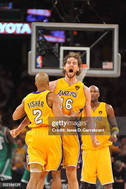 Pau Gasol and Derek Fisher of the Los Angeles Lakers celebrates against the Boston Celtics in Game Seven of the 2010 NBA Finals on June 17, 2010 at...