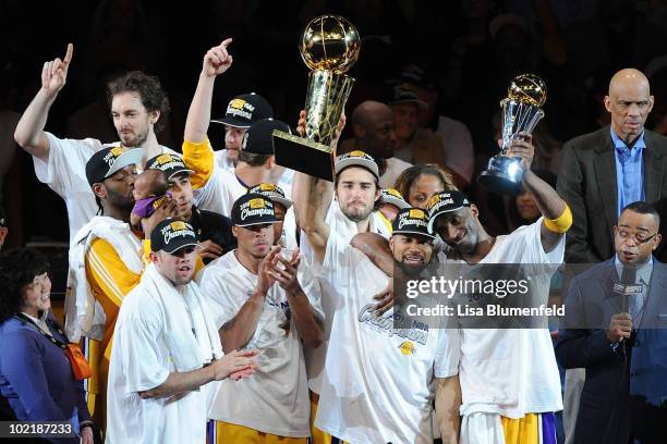 Kobe Bryant of the Los Angeles Lakers holds up the Larry O'Brien trophy after the Lakers defeated the Boston Celtics 83-79 in Game Seven of the 2010...