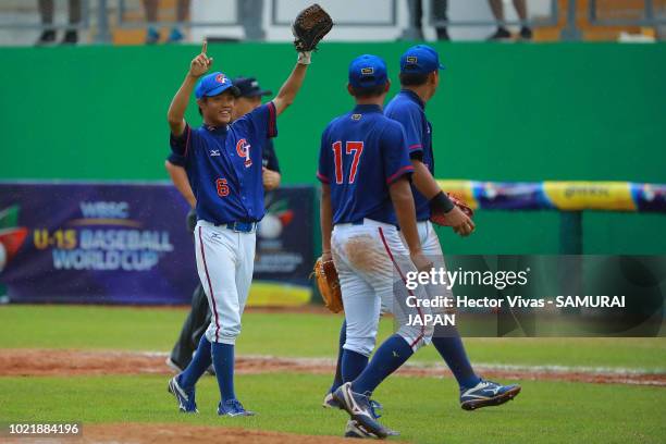 Players of Chinese Taipei celebrate after winning the match of WSBC U-15 World Cup Super Round between Japan and Chinese Taipei at Estadio Kenny...