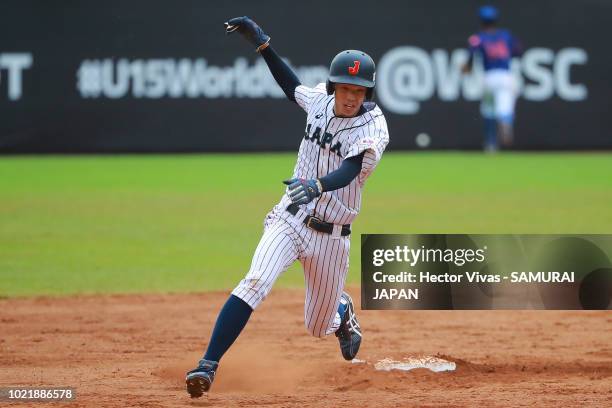 Asahi Hanada of Japan runs into second base in the 7th inning during the Bronze Medal match of WSBC U-15 World Cup Super Round between Japan and...