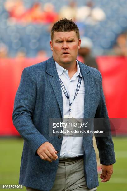 Executive Vice President/General Manager Jon Robinson watches from the sideline prior to a pre-season game against the Tampa Bay Buccaneers at Nissan...