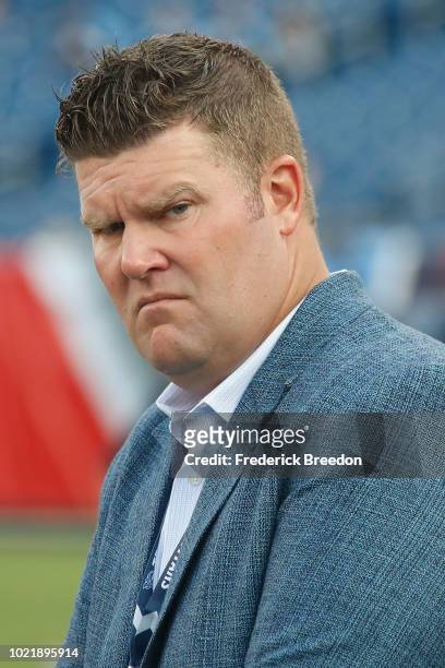 Executive Vice President/General Manager Jon Robinson watches from the sideline prior to a pre-season game against the Tampa Bay Buccaneers at Nissan...