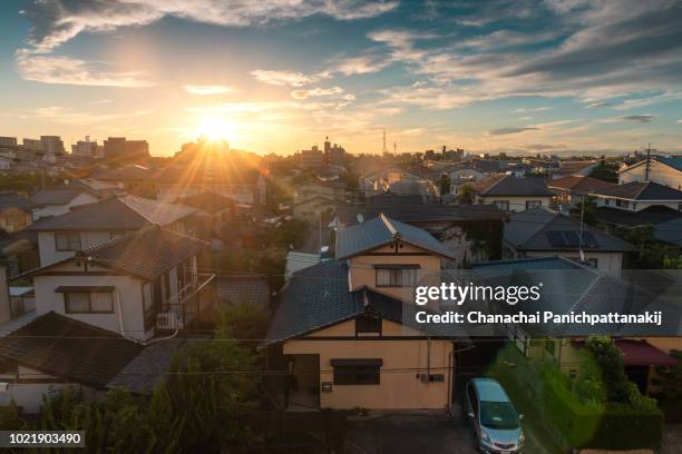 sunrise scene over saga city, japan - japan sunrise stock-fotos und bilder