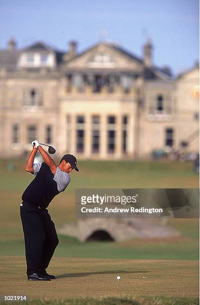 Tiger Woods of the USA tees off on the 18th hole during the third round of the British Open Championship at St Andrews Links Old Course in Fife,...