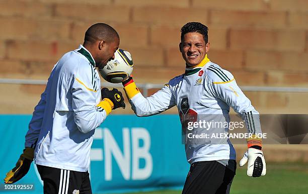 South Africa's goalkeepers Itumeleng Khune and Moeneeb Josephs take part in a training session in Johannesburg on June 18, 2010 during the 2010 World...