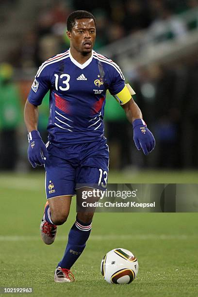 Patrice Evra of France runs with the ball during the 2010 FIFA World Cup South Africa Group A match between France and Mexico at the Peter Mokaba...