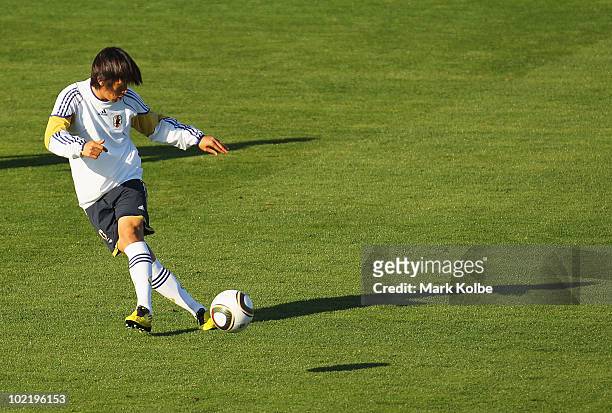 Shunsuke Nakamura passes at a Japan training session during the FIFA 2010 World Cup at Princess Magogo stadium on June 18, 2010 in Durban, South...