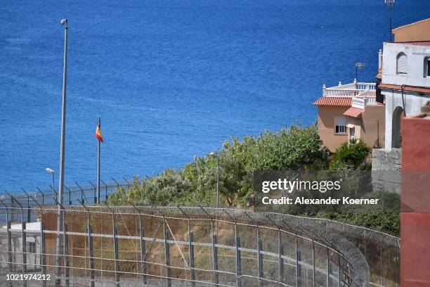 General view of the border fence separating the Spanish exclave of Ceuta from Morocco on August 23, 2018 in Ceuta, Spain. Many migrants are seeking...