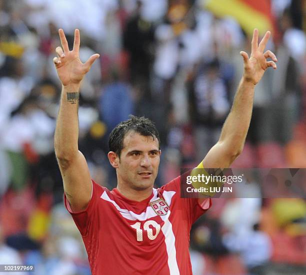 Serbia's midfielder Dejan Stankovic celebrates at the end of the Group D first round 2010 World Cup football match Germany vs. Serbia on June 18,...