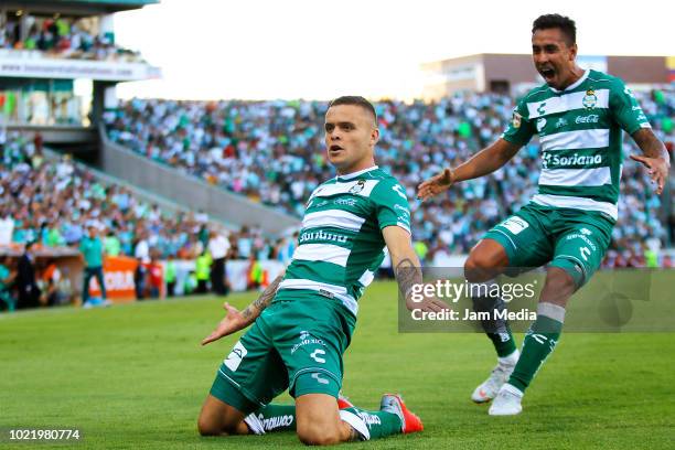 Jonathan Rodriguez of Santos celebrates with teammate Jesus Isijara after scoring the second goal of his team during the fifth round match between...