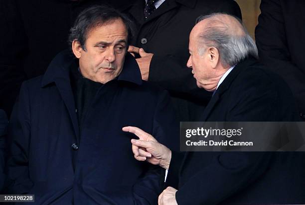 President Joseph Sepp Blatter and UEFA President Michel Platini attend the 2010 FIFA World Cup South Africa Group C match between Slovenia and USA at...