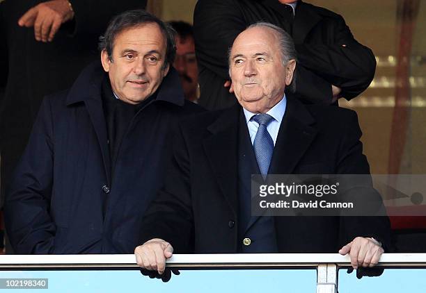 President Joseph Sepp Blatter and UEFA President Michel Platini attend the 2010 FIFA World Cup South Africa Group C match between Slovenia and USA at...