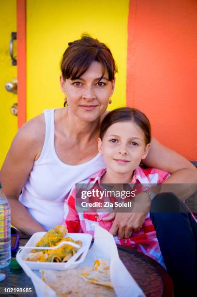 business mom and daughter share a cheap lunch - plastic plate stock pictures, royalty-free photos & images