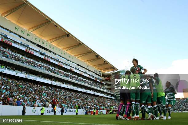 Julio Furch of Santos celebrates with teammates after scoring the first goal of his team during the fifth round match between Santos Laguna and...