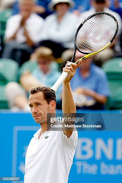 Michael Llodra of France acknowledges the crowd after his win over Alexandr Dolgopolov of the Ukraine during the semifinals of the AEGON...