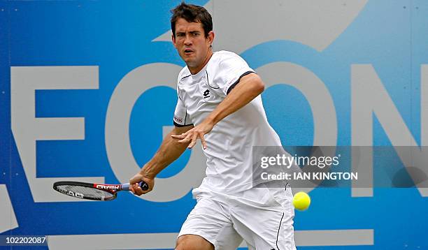 Guillermo Garcia-Lopez of Spain plays a shot against Denis Istomin of Uzbekistan during their men's semi final singles match on the fifth day of the...