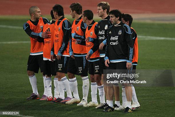 Diego Milito of Argentina's national football lines up in a wall during a team training session on June 18, 2010 in Pretoria, South Africa.