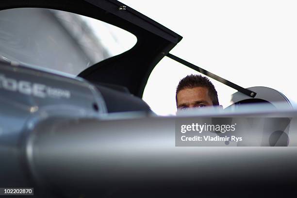 Hannes Arch of Austria sits in his plane at the Race Airport during the New York Red Bull Air Race Training Day on June 18, 2010 in New Jersey.