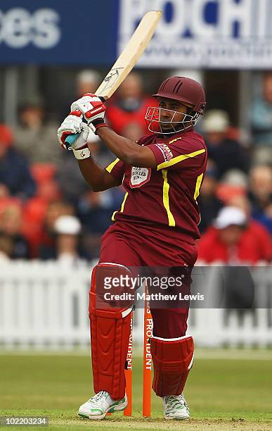 Chaminda Vaas of Northamptonshire hits the ball towards the boundary during the Friends Provident T20 match between Leicestershire and...