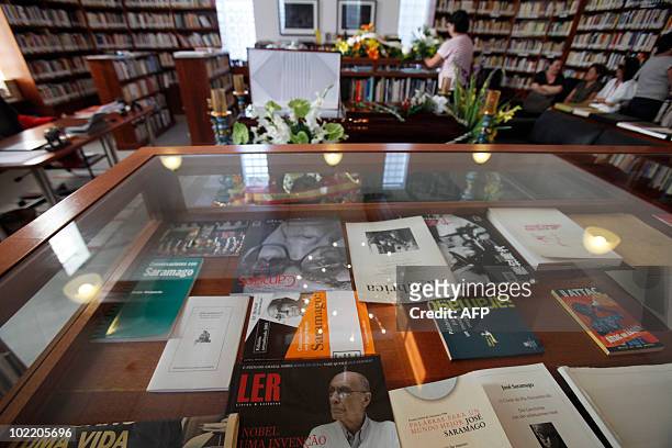 Books by deceased Nobel Literature Prize winner Jose Saramago are displayed as the body of Portuguese writer Jose Saramago lies in wake at the Jose...