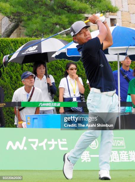 Shingo Katayama of Japan hits a tee shot on the 1st tee during the first round of the RIZAP KBC Augusta at Keya Golf Club on August 23, 2018 in...