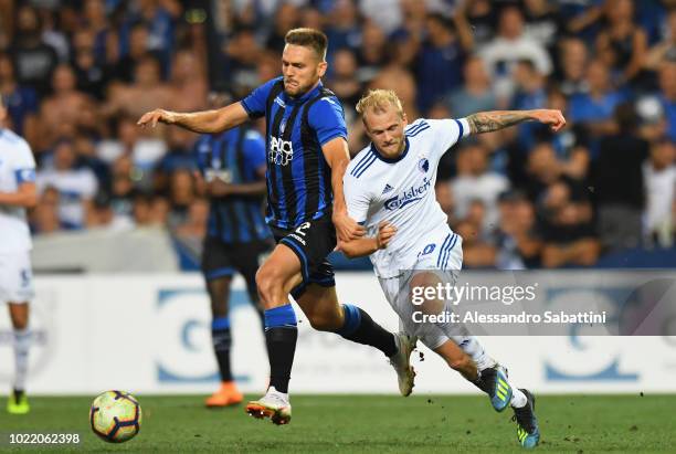 Rafael Toloi of Atalanta BC competes for the ball with Nicolai Boilesen of FC Copenhagen during the UEFA Europa League Play-Off between Atalanta BC...