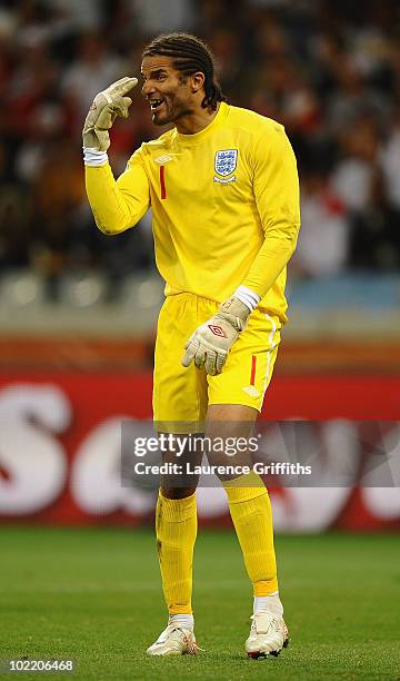 David James of England directs his defence to focus during the 2010 FIFA World Cup South Africa Group C match between England and Algeria at Green...