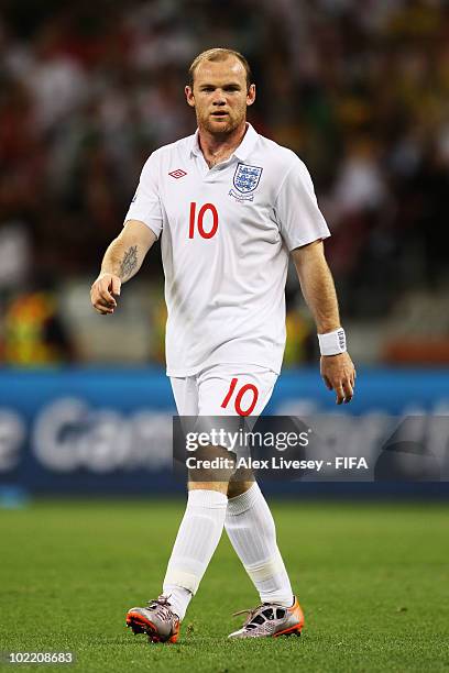 Wayne Rooney of England looks on during the 2010 FIFA World Cup South Africa Group C match between England and Algeria at Green Point Stadium on June...