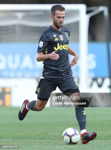 Miralem Pjanic of Juventus FC in action during the Serie A match between Chievo Verona and Juventus at Stadio Marc'Antonio Bentegodi on August 18,...