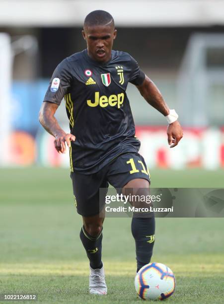 Douglas Costa of Juventus FC in action during the Serie A match between Chievo Verona and Juventus at Stadio Marc'Antonio Bentegodi on August 18,...