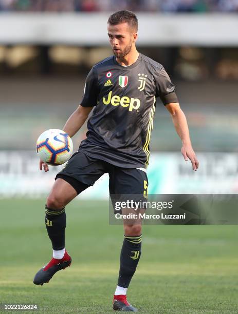 Miralem Pjanic of Juventus FC in action during the Serie A match between Chievo Verona and Juventus at Stadio Marc'Antonio Bentegodi on August 18,...