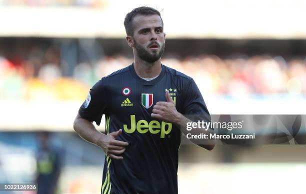 Miralem Pjanic of Juventus FC looks on during the Serie A match between Chievo Verona and Juventus at Stadio Marc'Antonio Bentegodi on August 18,...