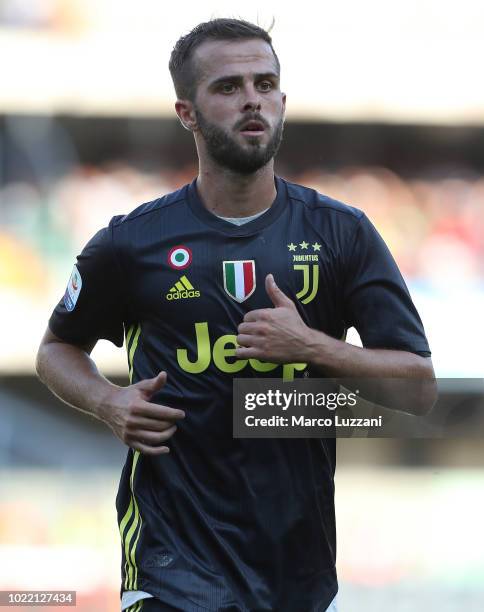 Miralem Pjanic of Juventus FC looks on during the Serie A match between Chievo Verona and Juventus at Stadio Marc'Antonio Bentegodi on August 18,...