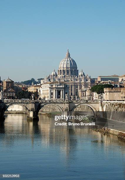 saint peter's basilica church and the tiber river. - saint peter's basilica stock pictures, royalty-free photos & images