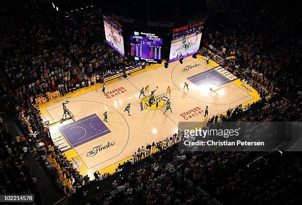 Andrew Bynum of the Los Angeles Lakers tips off against Rasheed Wallace of the Boston Celtics to start Game Seven of the 2010 NBA Finals at Staples...