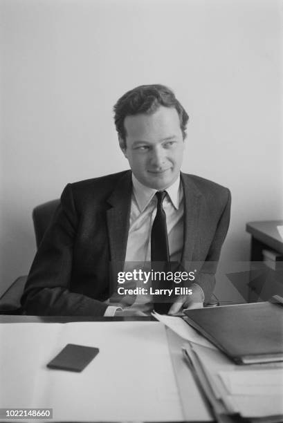 English music entrepreneur Brian Epstein , manager of the Beatles, in his new office, London, UK, 10th March 1964.