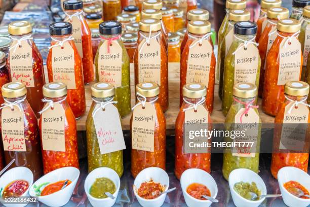 rissiepit sauces on display at the irene market - taste test stock pictures, royalty-free photos & images